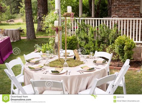 Rustic Outdoor Table Setting For Wedding Reception Stock