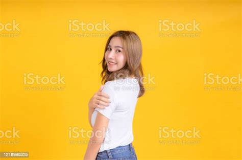 Portrait Happy Young Asian Woman Feeling Carefree Smiling Standing Positive Emotion In White