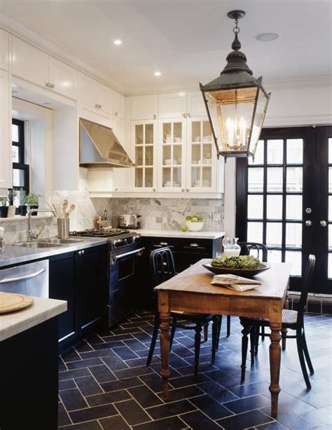 Below, we consider the upsides and downsides of using white cabinets that may not be immediately obvious, clear some misconceptions, and highlight some of the ways to get around common issues. White Upper Cabinets and Black Lower Cabinets - Transitional - kitchen