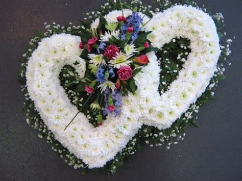 Maybe you would like to learn more about one of these? Double Heart Tribute | Floral Designs
