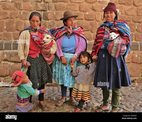 Indian Women With Children And Lambs Cusco Peru Stock Photo Alamy