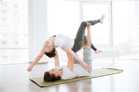 Relaxed Couple Practicing Acro Yoga Exercises Stock Image Image Of Acro Girl 72872227