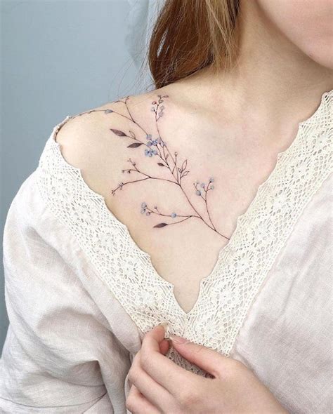 12 dainty tattoos on shoulder you won t regret getting in 2021 small shoulder tattoos floral