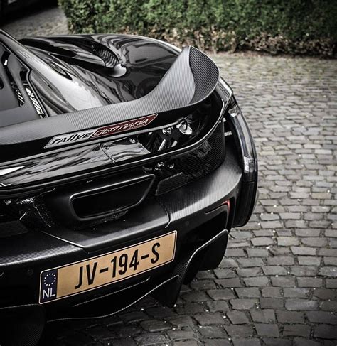 The same microsuede material complements the carbon fiber steering wheel. McLaren P1 (Instagram / @mg.carphotography) | Carbon fiber ...