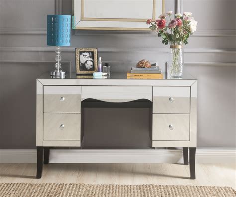 This mirrored vanity table provides a glamourous place to get ready in a bedroom. ACME Ratana Mirrored Vanity Desk with Mirrored Finish ...