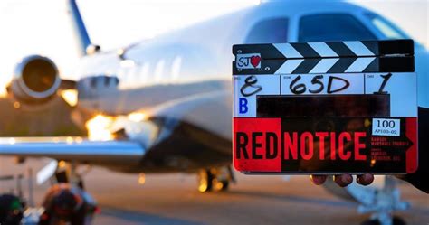 Netflix's red notice starring dwayne johnson, gal gadot and ryan reynolds has temporarily halted production amid the growing coronavirus outbreak. The Rock's Red Notice Begins Shooting for Netflix with ...