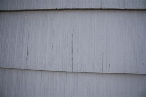 You can inspect the siding to determine if there is manufacturer information printed on it. Photos asbestos siding
