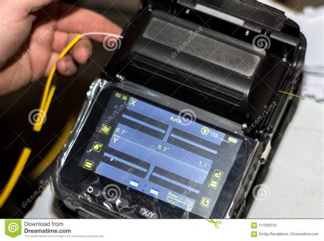 Engineer Splicing Fiber Optic Cable With Optical Fiber