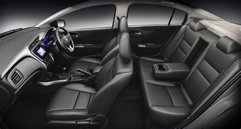 Black piano console includes an entertainment system with an. Honda City with new all-black interior launched in India