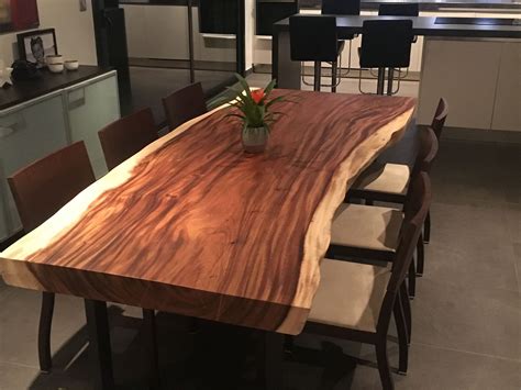Contemporary dining table - SUAR - Unik - walnut / lacquered wood 