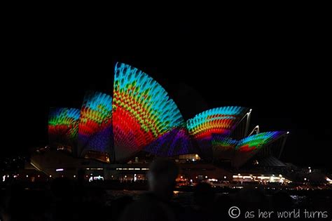 Light Show In Sydney Harbor As Her World Turns