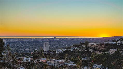 The hollywood hills straddle the cahuenga pass within the santa monica mountains. Hollywood Hills Sunset Photograph by Matthew Harper