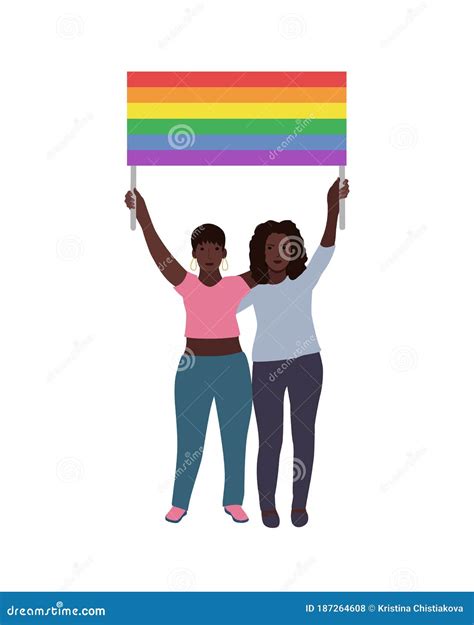 two black lgbt women holding a rainbow flag over their heads happy pride month stock