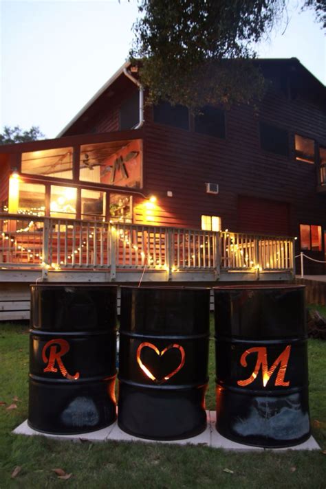 Rustic burn barrels with our initials | Barrel wedding, Burn barrel