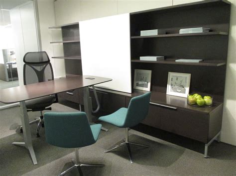 Teknion Journal Office With Floating Shelves And Sliding Whiteboard