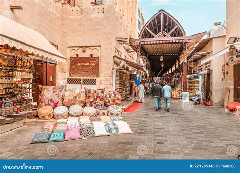 Old Bur Dubai Souk Market In Creek District Sellers And Merchants With Goods Textiles And