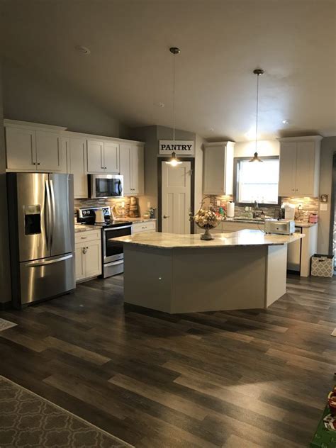 Products in stock include the hampton white shaker which has a white painted interior, and vail. Oak Luxury Vinyl Plank kitchen floor, gray and beige glass ...