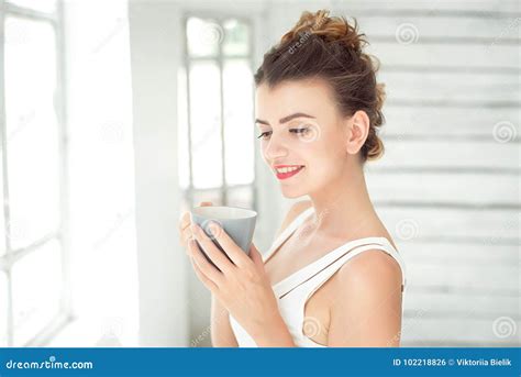Pretty Young Woman Holding A Cup Of Coffee Stock Photo Image Of