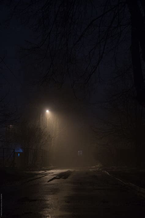 Dark Street And Lamp At Night By Stocksy Contributor Danil Nevsky