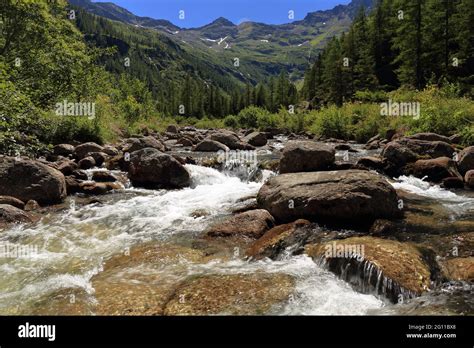 High Mountain River With Mountains Background Stock Photo Alamy