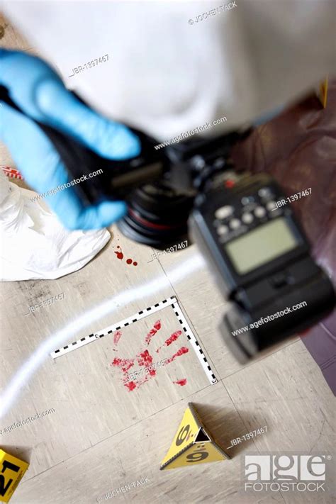 Photographic Securing Of Forensic Evidence By Officer Of The Cid