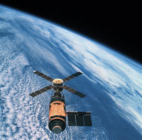 Elevated View Of A Satellite Orbiting In Space Photograph By Stockbyte
