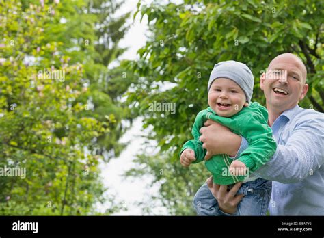 Little Boy Playing Outside In Stock Photos & Little Boy Playing Outside In Stock Images - Alamy