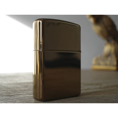 Prices for solid gold lighters may vary due to fluctuating market value of precious metals. Zippo Lighter color: golden brass bronze - GERMANUS