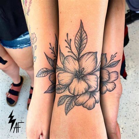 Hawaiian Flowers Tattoos On Wrist