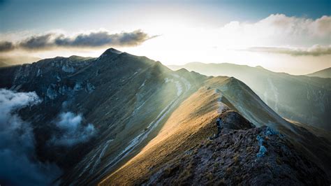 Mountain Under Cloudy Sky With Sunlight · Free Stock Photo