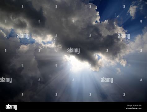 Sun Rays Through Dark Clouds Hi Res Stock Photography And Images Alamy