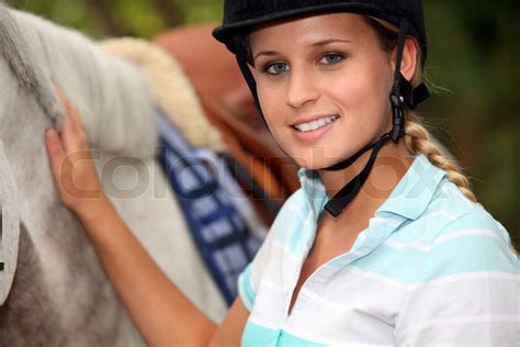 A Horseback Rider With Her Horse Stock Image Colourbox