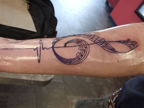 Excuse The Tegaderm Presley Did This Treble Clef And Heartbeat Tattoo