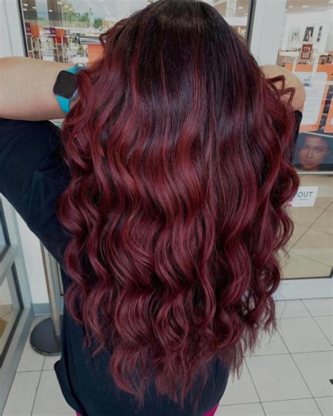 29 hottest red hair with blonde highlights for 2024 black cherry hair black cherry hair color