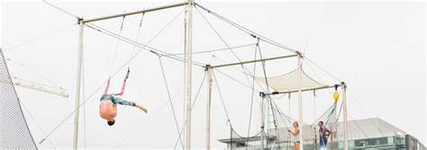 A Flying Trapeze Artist Starts Her Swing From Rest Letter G Decoration