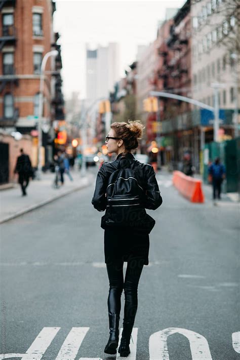 Blond Woman Walking Down The Street In Nyc Back View By Stocksy Contributor Michela Ravasio