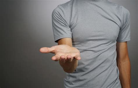 Man Holding Something On His Palm Stock Photo Download Image Now Istock