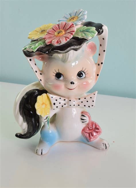 vintage ceramic skunk kitschy cute cute face big eyes kitsch 50s ceramics by