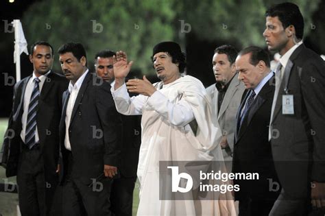 Image Of Muammar Gaddafi And Silvio Berlusconi Rome Italy 2010 Photo