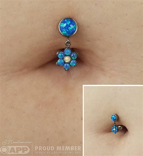 Fully Healed Floating Navel Piercing On Dana Featuring Her Custom Ordered Dark Blue And W