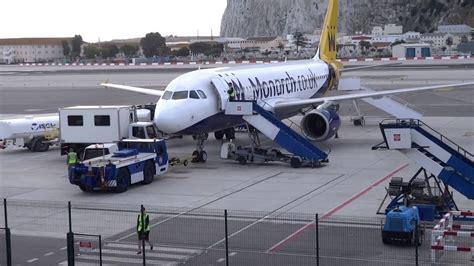 It has a design capacity of one million passengers a year. Gibraltar Airport Monarch A320 flight arrival on stand ...