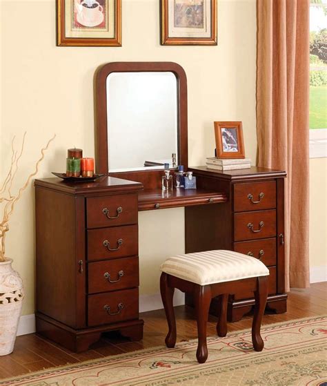 If you are looking for a practical makeup vanity table set, do not miss this modern makeup vanity table set with its triple folding mirror and cushioned dressing stool. Cherry Vanity Set AC 565 | Bedroom Vanity Sets