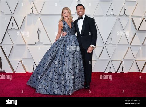 Kelly Ripa And Mark Consuelos Walking On The 2019 Oscars Red Carpet At