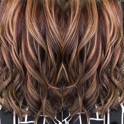 Chunky highlights in blonde and light brown create a fresh, modern appearance on dark hair. Red brown hair with caramel highlights | Hair color ...