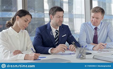 Middle Aged Businessman Having Talk With Employees Stock Image Image