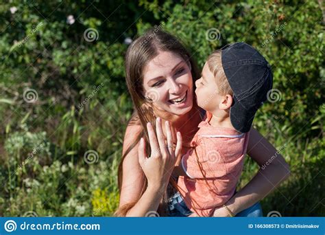Beautiful Mom With Her Son On A Picnic Rest In Nature Stock Image Image Of Clothes Jeans