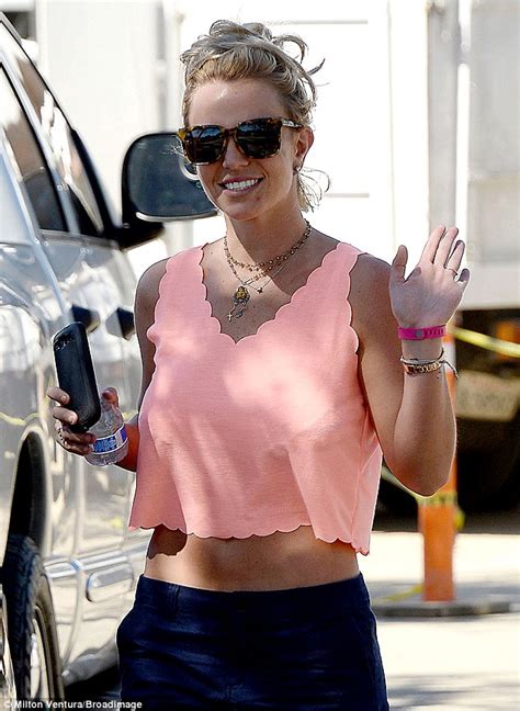 Britney Spears Flashes Toned Midriff In Cropped Tank Top And Shorts Daily Mail Online