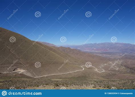 Winding And Dirty Road Humahuaca North Of Argentina Stock Photo