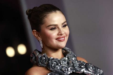 selena gomez s bold fashion statement a look back at her unforgettable nip slip moment