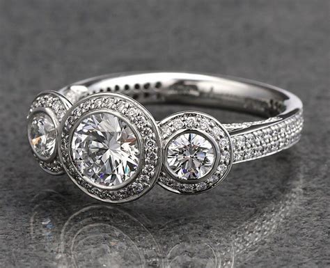 At diamond mansion we think believe engagement ring should reflect your personal style, and when you design your own engagement ring, there are so many ways to make your ring unique.we love to help you include elements that reflect your personal style, such as a. What does a three-stone engagement ring symbolize? (With images) | Art deco engagement ring